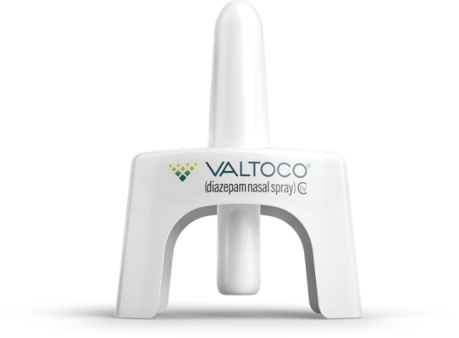 A single-use Valtoco diazepam nasal spray device: a white nozzle above a U-shaped plunger.